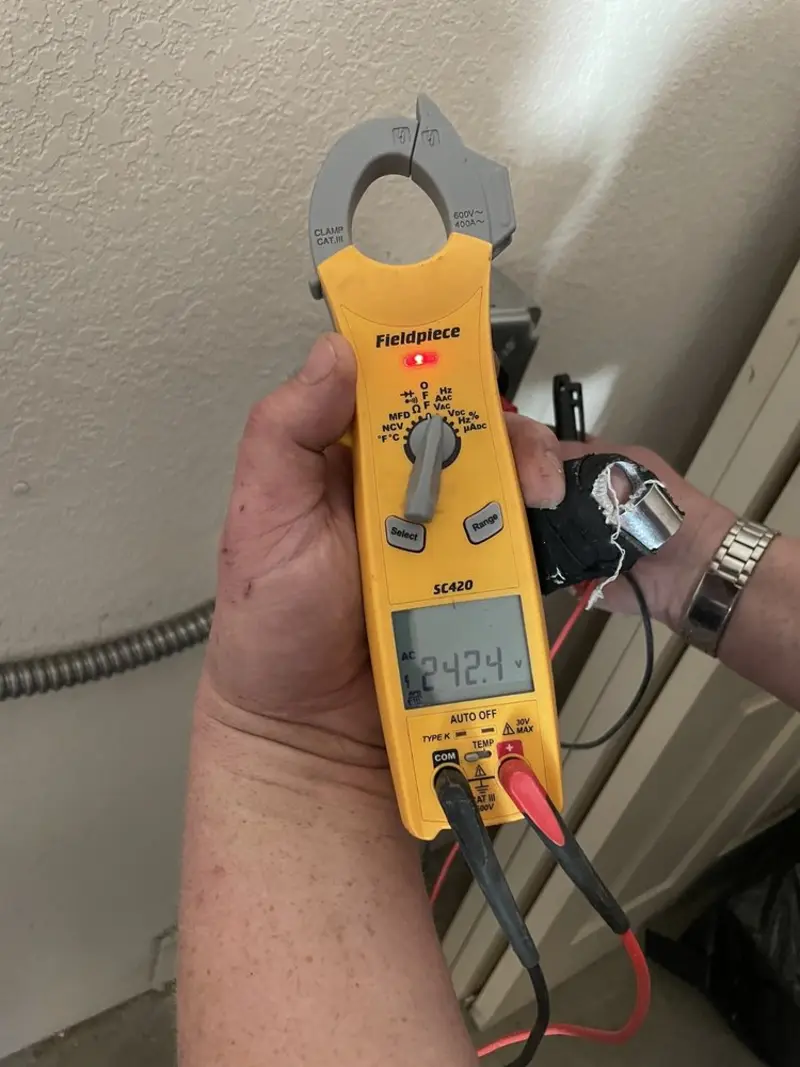 Voltage testing with clamp meter during Hot Tub / Pool Electrical Wiring in Flemington